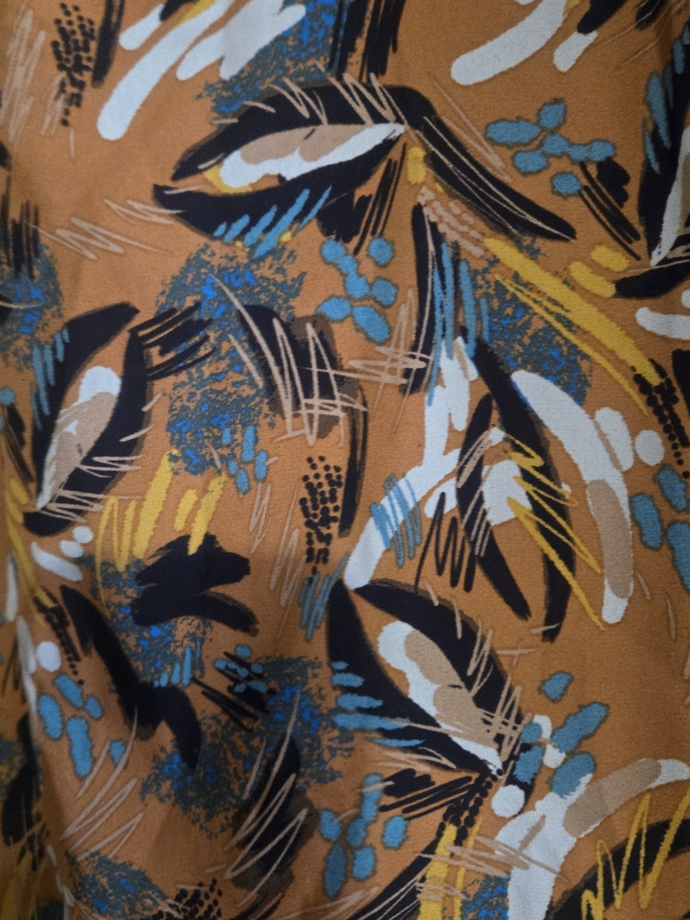 DR2 Burnt Orange Abstract Feather-Print V-Neck Blouse - Picture 2 of 3